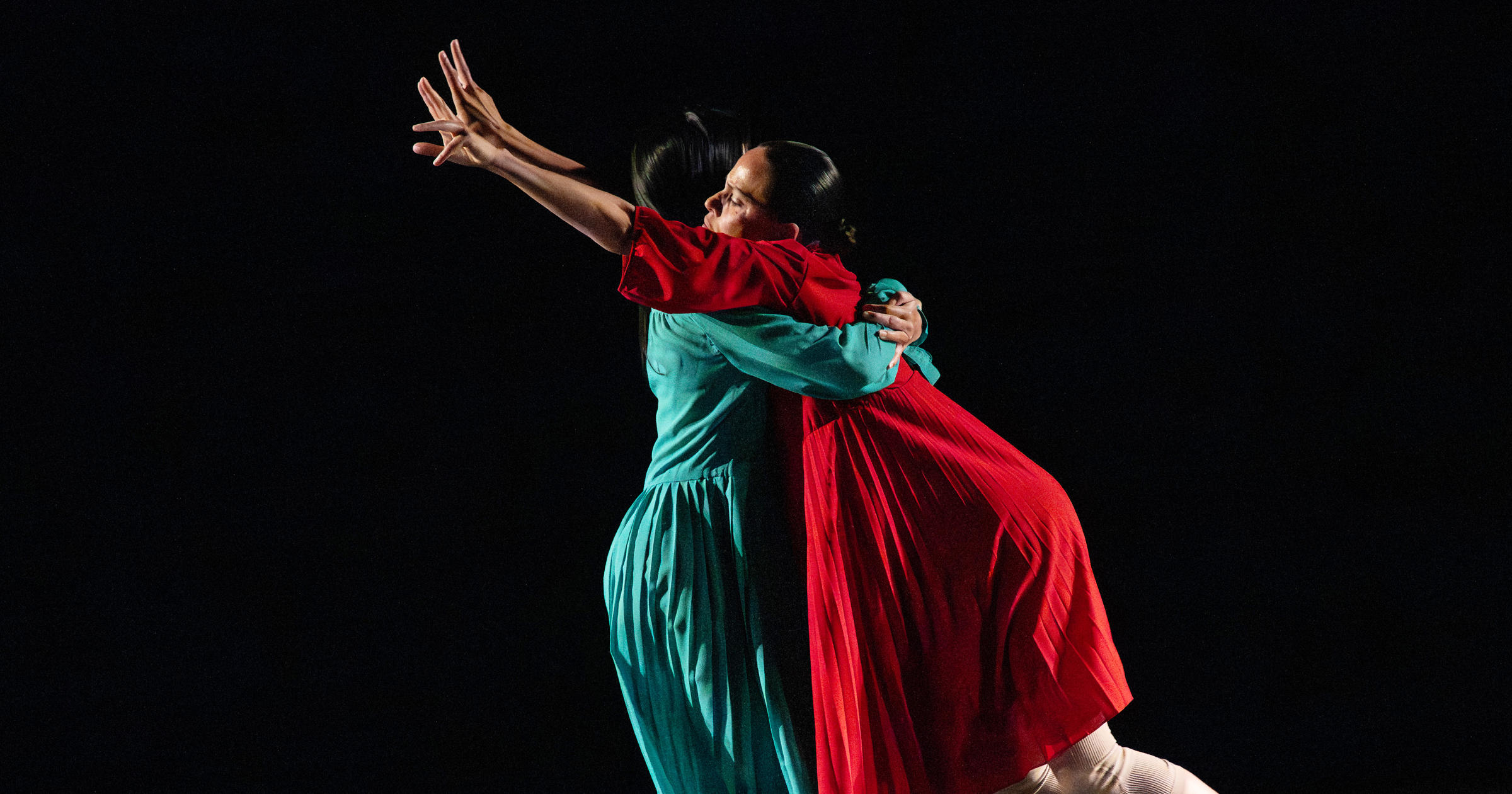 Union PDX - Festival:23 artist Sridharini Sridharan performing her solo 'Clarion Call' at the Hampton Opera Center in Portland, Oregon. The number 26 overlays the image to indicate the festival year. | Photography: Jingzi Zhao